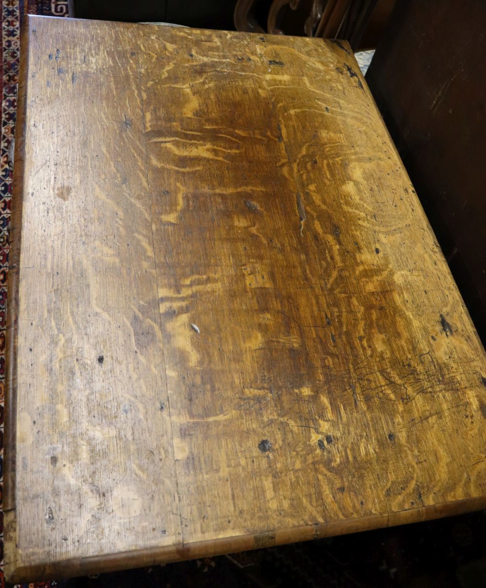 A 17th century and later carved oak side table with spiral-twist supports, width 86cm depth 59cm height 73cm